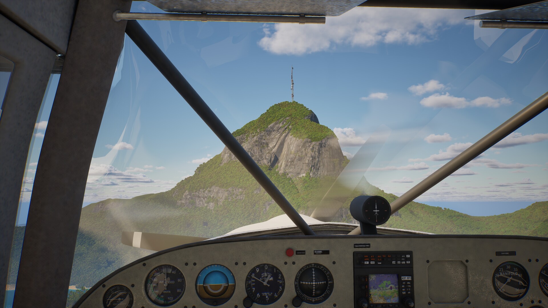 Cartel Pilots Wanted Cockpit mit Aussicht auf Berg