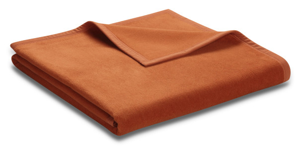 Wohndecke UNICOLOUR in orange aus Mischgewebe