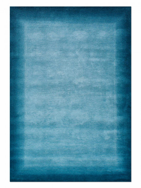 Teppich TAMI in blau aus Schurwolle